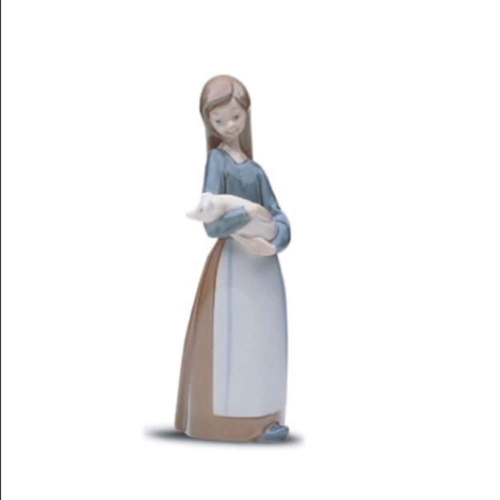 Lladro girl with pig figurine